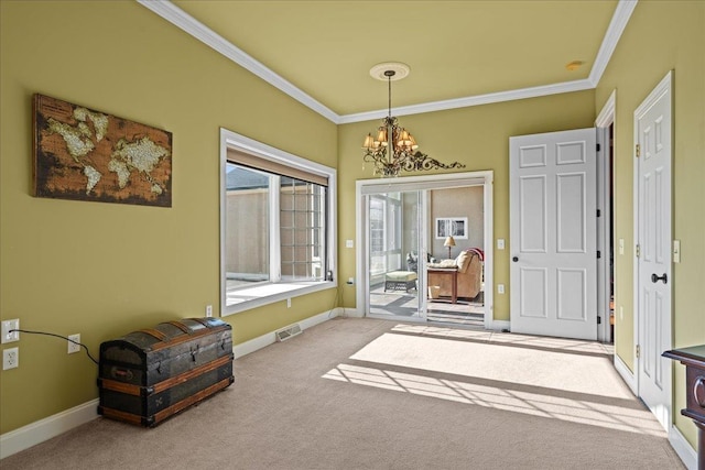 dining area featuring crown molding, an inviting chandelier, visible vents, and carpet flooring