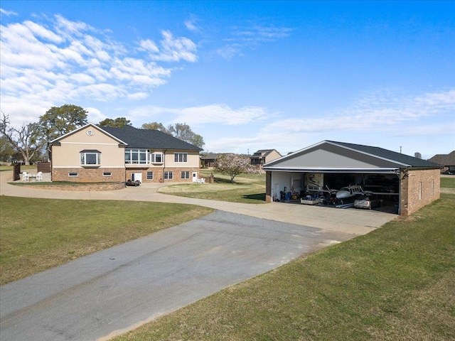exterior space featuring concrete driveway and a garage
