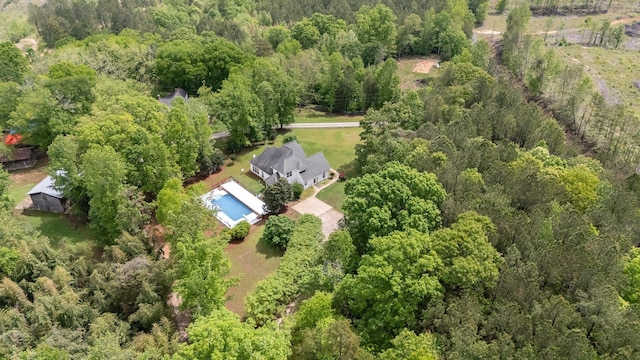 aerial view with a wooded view