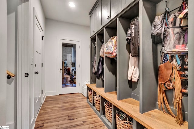 mudroom with recessed lighting and light wood-style flooring