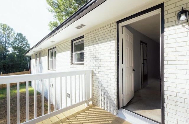 exterior space with brick siding