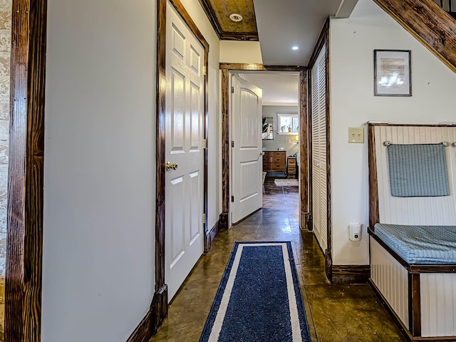corridor featuring recessed lighting and concrete floors