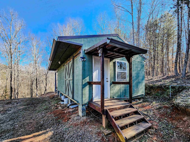 exterior space with an outbuilding
