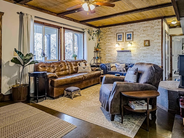 living area with wood ceiling, ceiling fan, and ornamental molding
