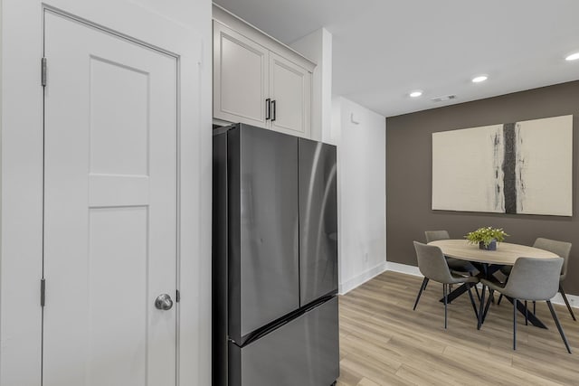 173 Dalmatian, Spartanburg, SC 29307 - kitchen with visible vents, freestanding refrigerator, baseboards, recessed lighting, and light wood finished floors