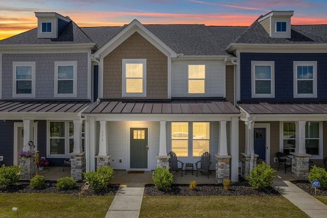 173 Dalmatian, Spartanburg, SC 29307 - townhome / multi-family property with a standing seam roof, a shingled roof, and covered porch