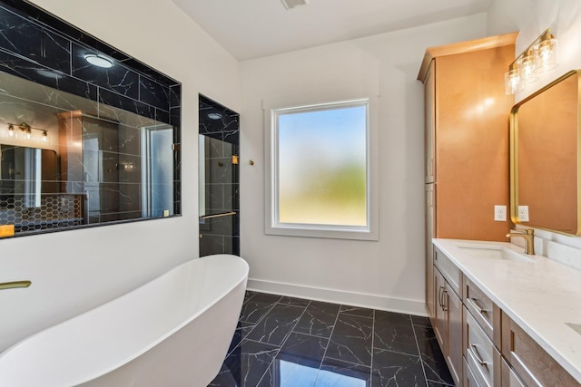 full bathroom with a tile shower, double vanity, baseboards, a freestanding tub, and marble finish floor