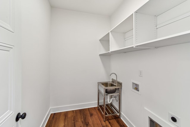 clothes washing area featuring baseboards, hookup for a washing machine, laundry area, hookup for an electric dryer, and dark wood-style floors