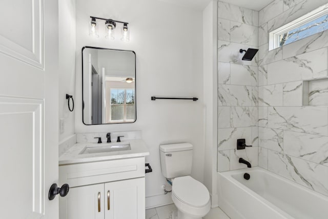 bathroom with marble finish floor, toilet, vanity, baseboards, and tub / shower combination
