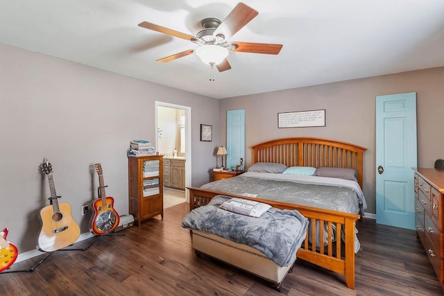 bedroom featuring baseboards, a ceiling fan, dark wood-style flooring, and connected bathroom