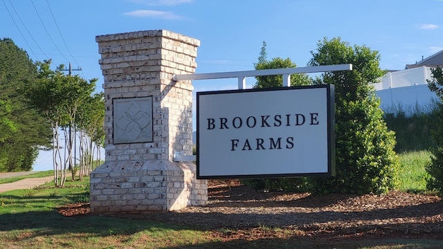 view of community sign