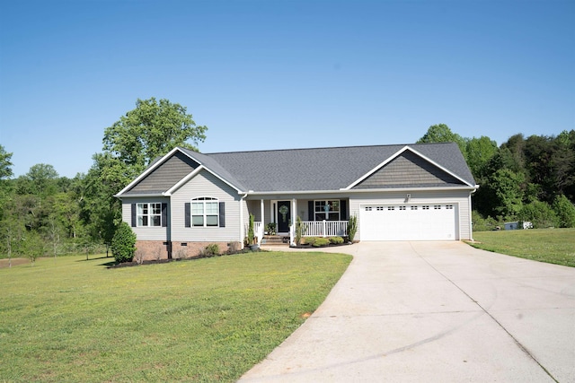ranch-style home with a front lawn, covered porch, crawl space, an attached garage, and driveway