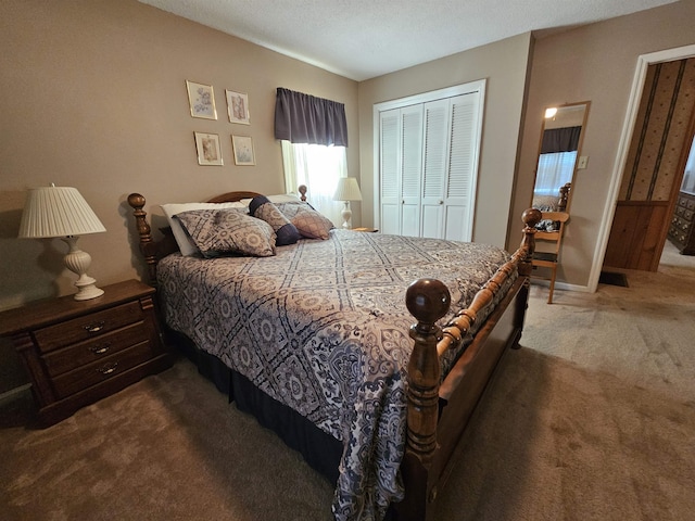 bedroom with carpet and a closet