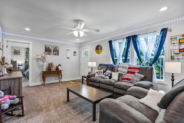 living area with recessed lighting, ceiling fan, baseboards, and carpet