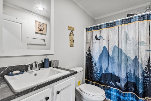 bathroom with crown molding, toilet, a shower with curtain, and vanity
