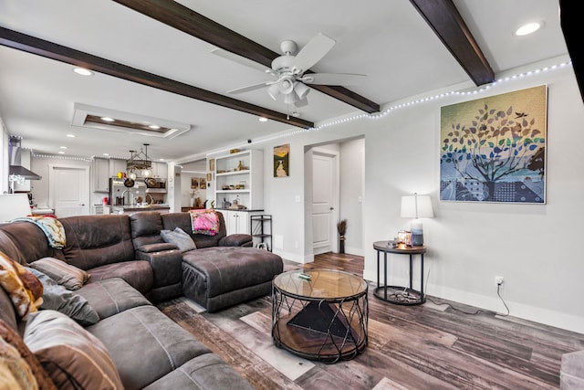 living room featuring recessed lighting, beamed ceiling, ceiling fan, and dark wood-type flooring