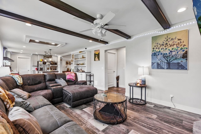 living room with dark wood-style flooring, recessed lighting, beamed ceiling, and ceiling fan