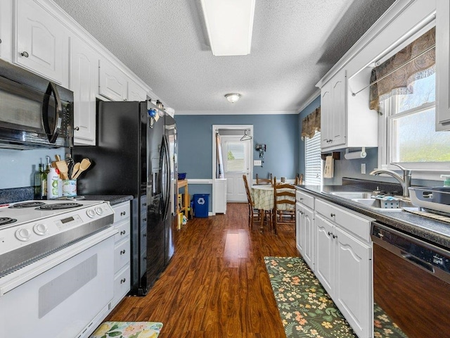 kitchen featuring a sink, white cabinetry, a textured ceiling, and black appliances