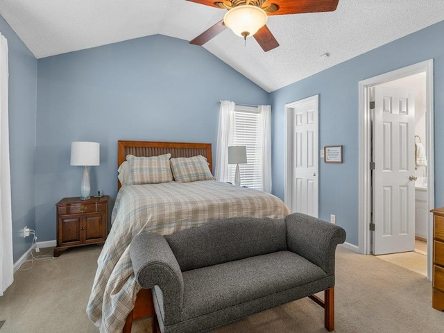 bedroom with a ceiling fan, baseboards, light carpet, and vaulted ceiling