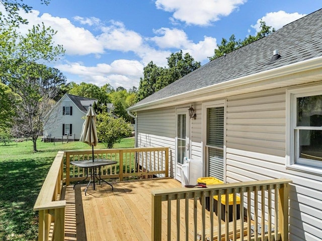 deck featuring a yard
