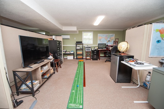 carpeted office featuring ornamental molding, an AC wall unit, and a textured ceiling