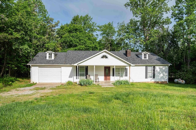 view of front of property featuring a porch, a chimney, dirt driveway, a front lawn, and an attached garage