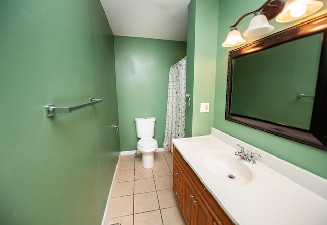 full bath featuring tile patterned flooring, baseboards, toilet, and vanity