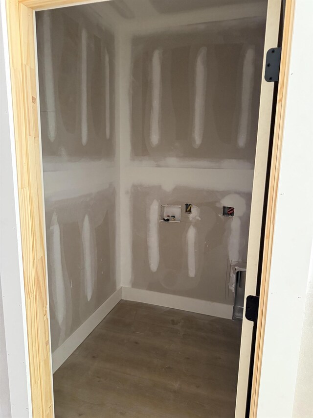 397 Wynette, Inman, SC 29349 - laundry room featuring hookup for a washing machine, wood finished floors, and baseboards