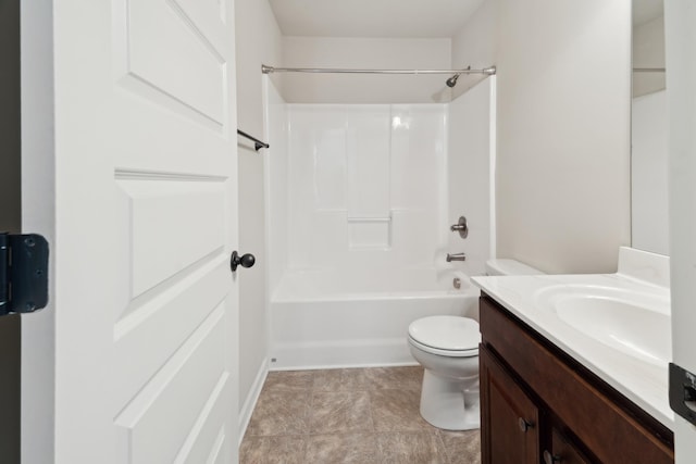 bathroom featuring toilet, bathing tub / shower combination, and vanity