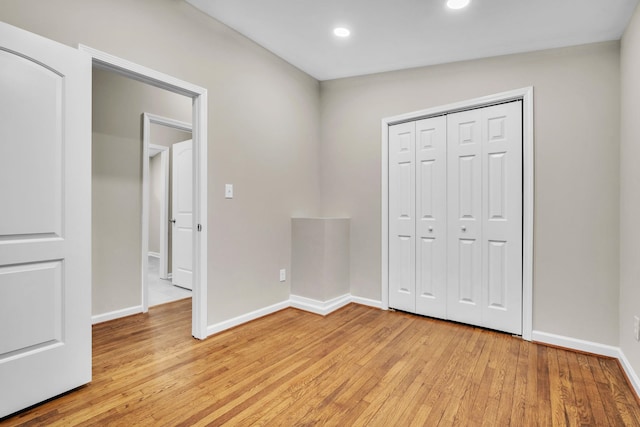 103 Forest Hls, Gaffney, SC 29340 - unfurnished bedroom with light wood-style floors, baseboards, a closet, and recessed lighting