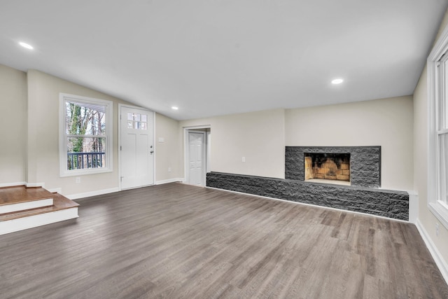 103 Forest Hls, Gaffney, SC 29340 - unfurnished living room with wood finished floors, a fireplace, baseboards, recessed lighting, and vaulted ceiling