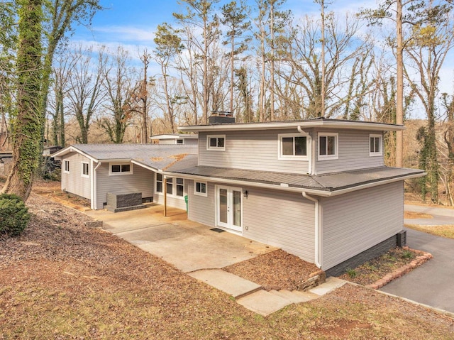 103 Forest Hls, Gaffney, SC 29340 - rear view of house with french doors, a chimney, and a patio area