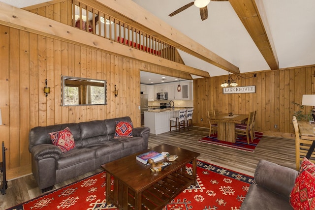 1000-2 Captains Cv, Salem, SC 29676 - living room featuring wood finished floors, baseboards, ceiling fan, wooden walls, and lofted ceiling with beams