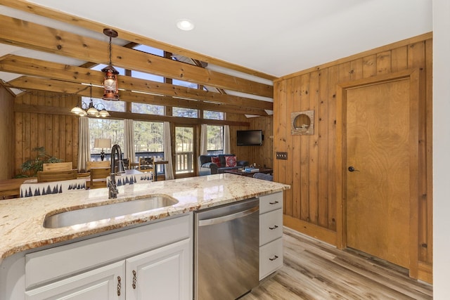 1000-2 Captains Cv, Salem, SC 29676 - kitchen featuring pendant lighting, wood walls, dishwasher, a sink, and light wood-style floors