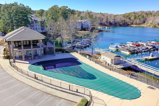 1000-2 Captains Cv, Salem, SC 29676 - community pool with a dock, a water view, fence, and a patio area