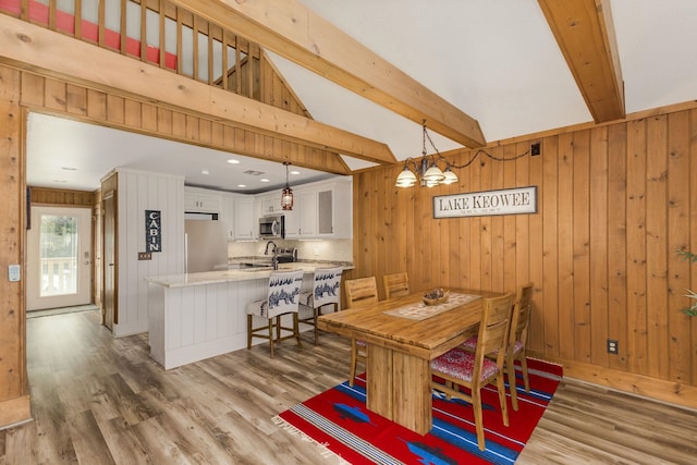1000-2 Captains Cv, Salem, SC 29676 - dining area with wooden walls, vaulted ceiling with beams, and light wood-type flooring