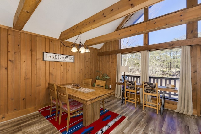 1000-2 Captains Cv, Salem, SC 29676 - dining space featuring plenty of natural light, wood walls, beam ceiling, and a notable chandelier