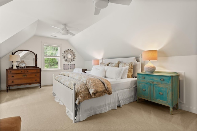 bedroom with visible vents, a ceiling fan, lofted ceiling, and light colored carpet