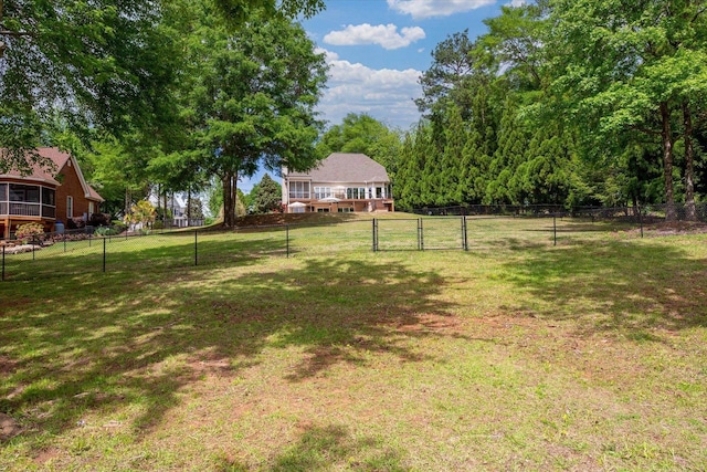view of yard with a gate and fence