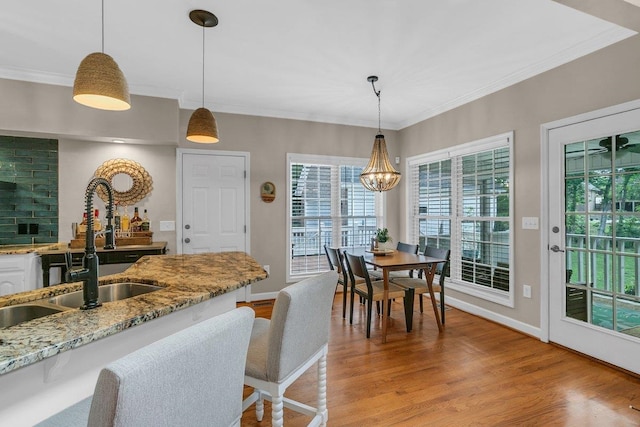 268 Antrim, Moore, SC 29369 - dining room with light wood-type flooring, ornamental molding, and baseboards