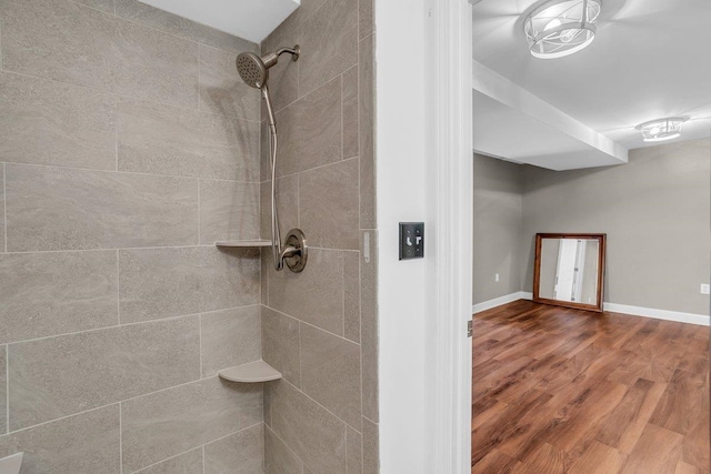 268 Antrim, Moore, SC 29369 - full bathroom featuring baseboards, a tile shower, and wood finished floors
