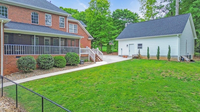 268 Antrim, Moore, SC 29369 - back of property featuring roof with shingles, a sunroom, brick siding, fence, and a yard