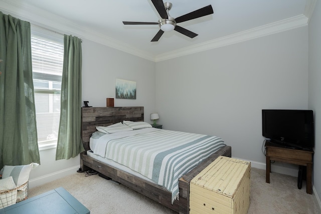 bedroom featuring crown molding, baseboards, multiple windows, and light colored carpet