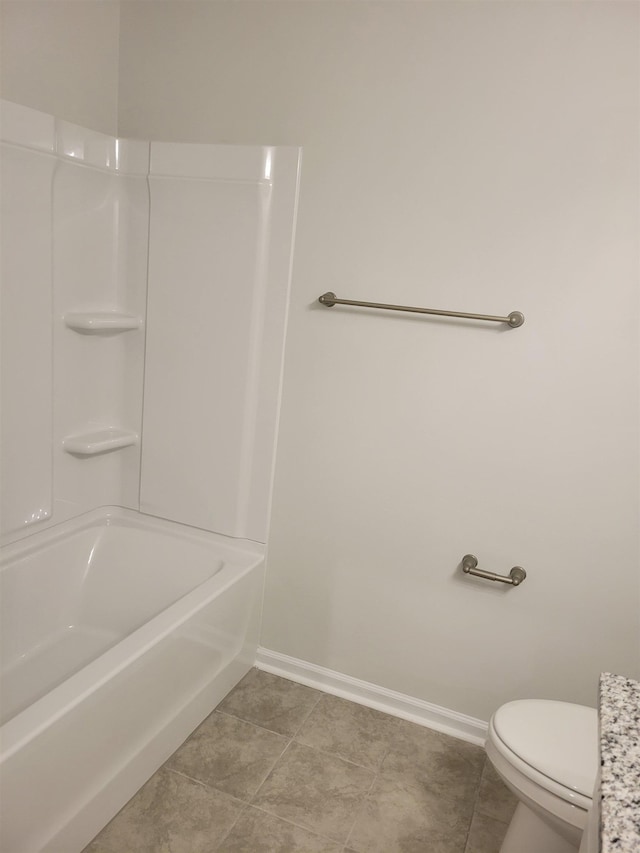 full bathroom featuring toilet, baseboards, and tile patterned floors