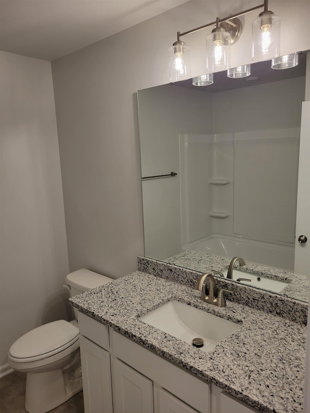 full bath with vanity, tile patterned floors, and toilet
