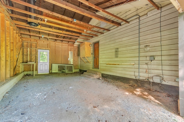 misc room with a garage