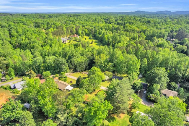 drone / aerial view with a forest view