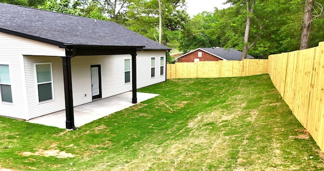 view of yard featuring a fenced backyard and a patio area