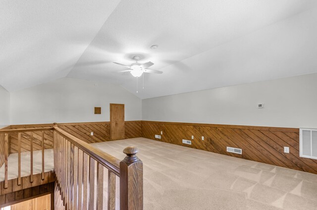 244 Brittany, Gaffney, SC 29341 - bonus room with ceiling fan, visible vents, vaulted ceiling, wainscoting, and wood walls