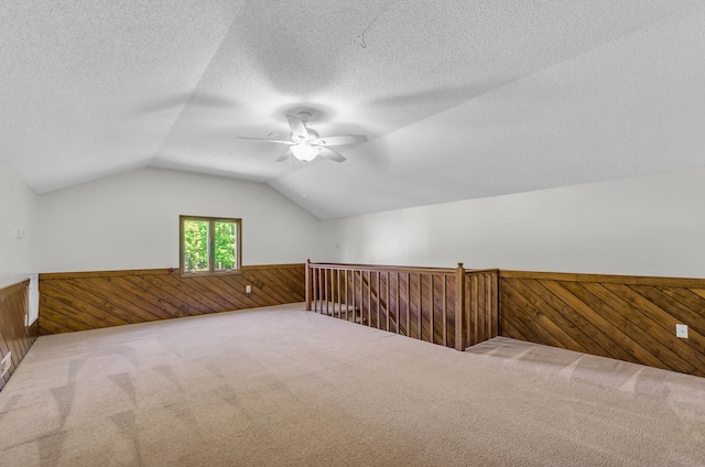 244 Brittany, Gaffney, SC 29341 - bonus room featuring carpet floors, wood walls, ceiling fan, a wainscoted wall, and vaulted ceiling